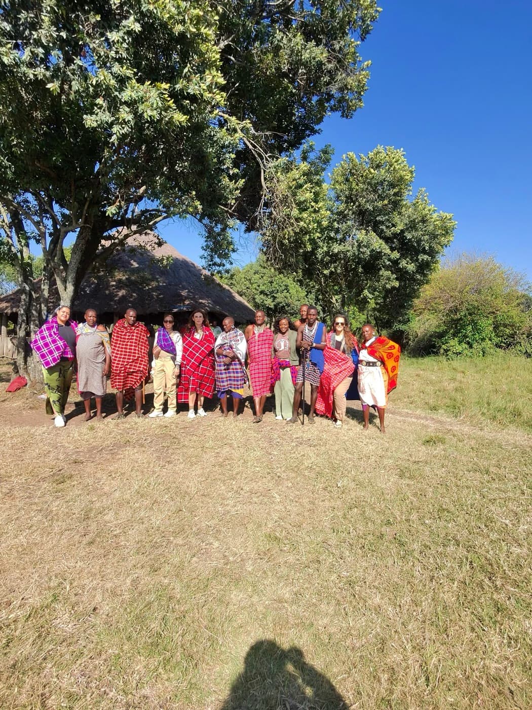 Diaspora Roots and Routes travelers and Maasai hosts gathered outdoors